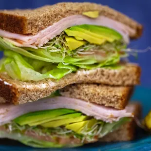 Turkey Sandwich with Lettuces + Avocado + Alfalfa sprouts