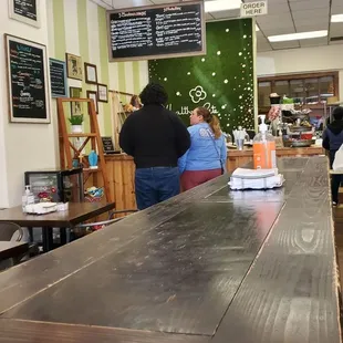 a couple of people in a restaurant