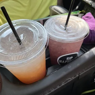 two drinks in plastic cups