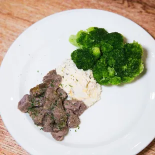beef and broccoli on a plate