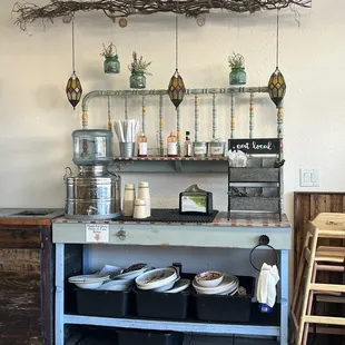 a counter with pots and pans