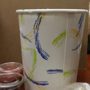 Pho profile...my attempt to show the size of the container...set against a standard sized note pad in the back.