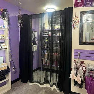 Adult items behind curtain