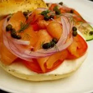 Lox on a Multi-Grain Bagel Thin with Fresh Tomato, Onion, and Capers
