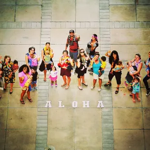 Gathering with moms and babies at the Hawaii State Capitol to lobby for improvements to laws protecting mothers from discrimination