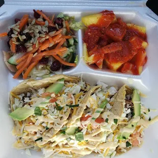 Brisket tacos, salad, pineapple with chili powder/chamoy.