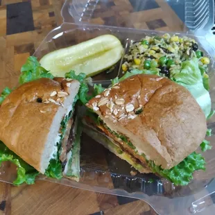 NEW SICILIAN  14.00 GRILLED CHICKEN BREAST, OLIVE SPREAD, ROASTED TOMATOES. AVOCADO, GRILLED ONIONS, RED PEPPER SAUCE, LETTUCE