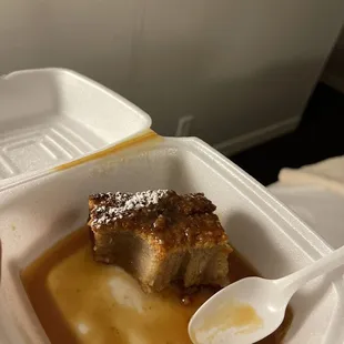 a piece of food in a styrofoam container