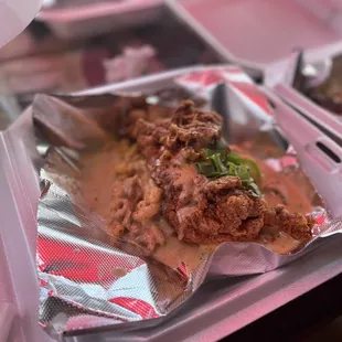 two trays of food on a table