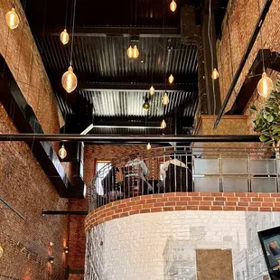 Classic brick building with high ceilings and nice natural light.