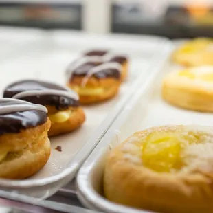 a variety of pastries on trays