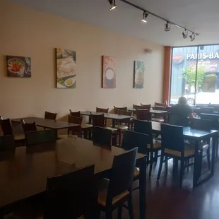 a restaurant with tables and chairs