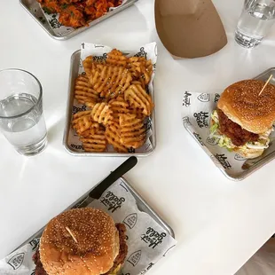 Spicy fried chicken sandwich, everything but the bagel waffle fries, chicken wings