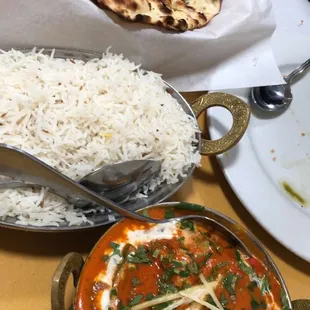 Spicy butter chicken, rice and garlic naan