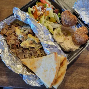 Ultimate plate. Chicken shawarma. Beef and lamb gyro  Hummus Greek salad and falafel.