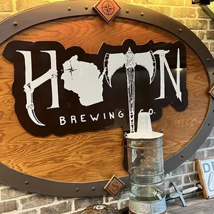 a beer keg and a sign