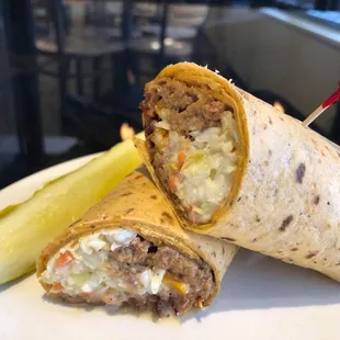 The pulled pork wrap features home-smoked pork and creamy cole slaw