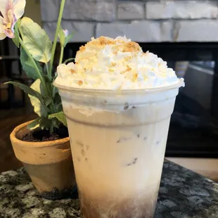 Try one of our signature coffee features, like the Coconut Cream Pie Iced latte!