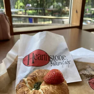 Small veggie croissant; fluffy scrambled eggs, tomato, spinach, provolone and oregano