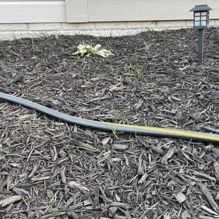 a picture of a hose in the ground