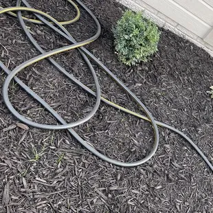 a picture of a hose connected to the ground