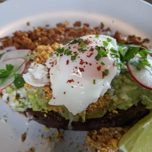 Avocado toast with egg and chorizo