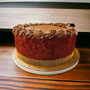 a red velvet cake with chocolate frosting