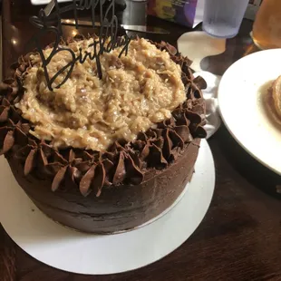 German chocolate cake with buttercream frosting and coconut-pecan filling