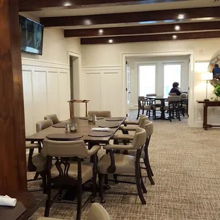 dining area with tables and chairs