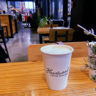 a cup of coffee on a table