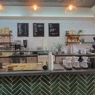 a woman working behind the counter