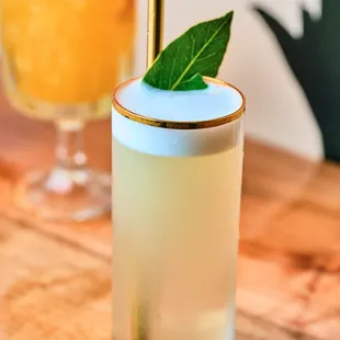 a glass of lemonade and a glass of orange juice