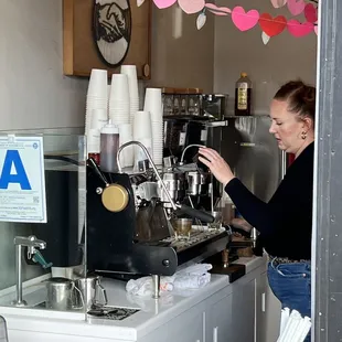 Barista making coffee