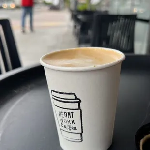 a cup of coffee on a table