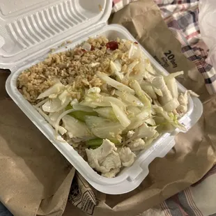 chicken and rice in a styrofoam container