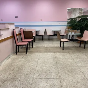 pink chairs and tables