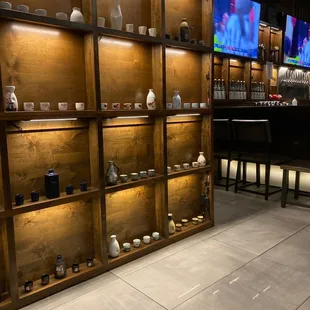 shelves of tea cups and teapots