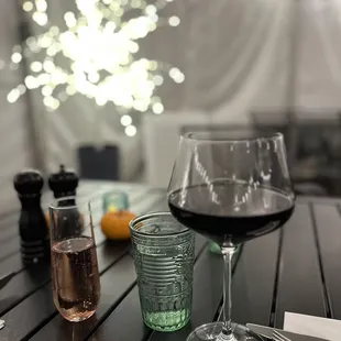 two glasses of wine on a table