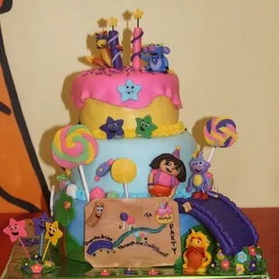 Custom Dora The Explorer cake. Just told her what I had in mind, and this was the masterpiece she created!