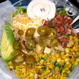 a salad in a plastic container
