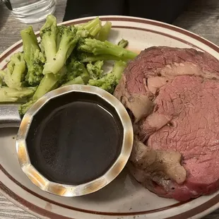 Prime rib with steamed broccoli