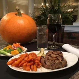 Grilled Ribeye, Sweet potato fries and our signature Smashberry Red wine!