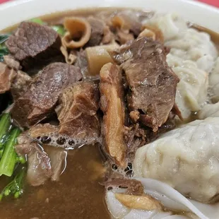 Ho fun with brisket, tendon and wonton.  Each wonton had a generous shrimp in it.  A bargain for $15