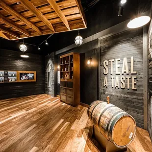 a barrel of wine in the tasting room