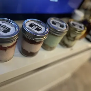 (Left to right) 8oz Strawberry Cheesecake, 8oz Red Velvet, Key Lime Pie, 8oz Tiramisu