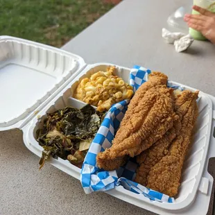 Catfish plate with collard greens and mac and cheese