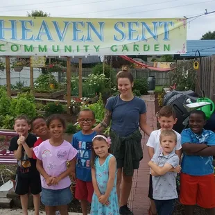 Working with Ms. Haley learning how to grow our food.