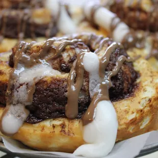 Cinnamon Roll drizzled in chocolate and icing