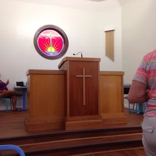 They even left the pulpit and made it into a bar to sit at. Pews and tables are also available.