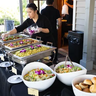 Classic Caesar salad and bread rolls